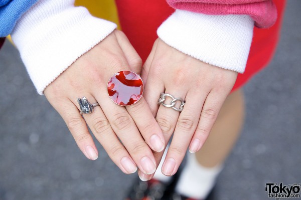 Silver rings & large red swirly ring in Harajuku