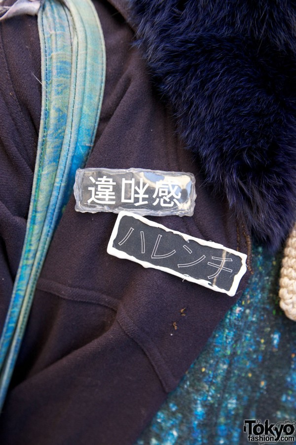 Japanese text pins in Harajuku
