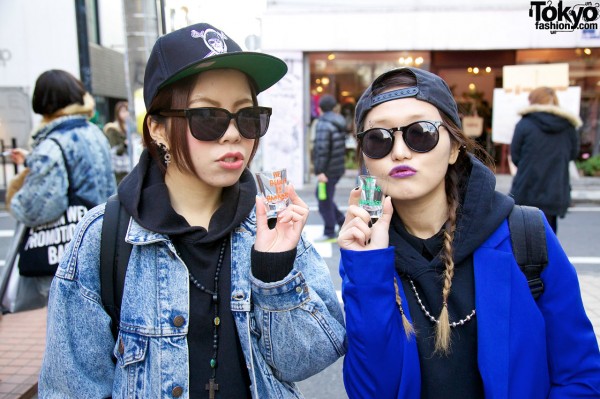 Girls with shot glasses in Harajuku