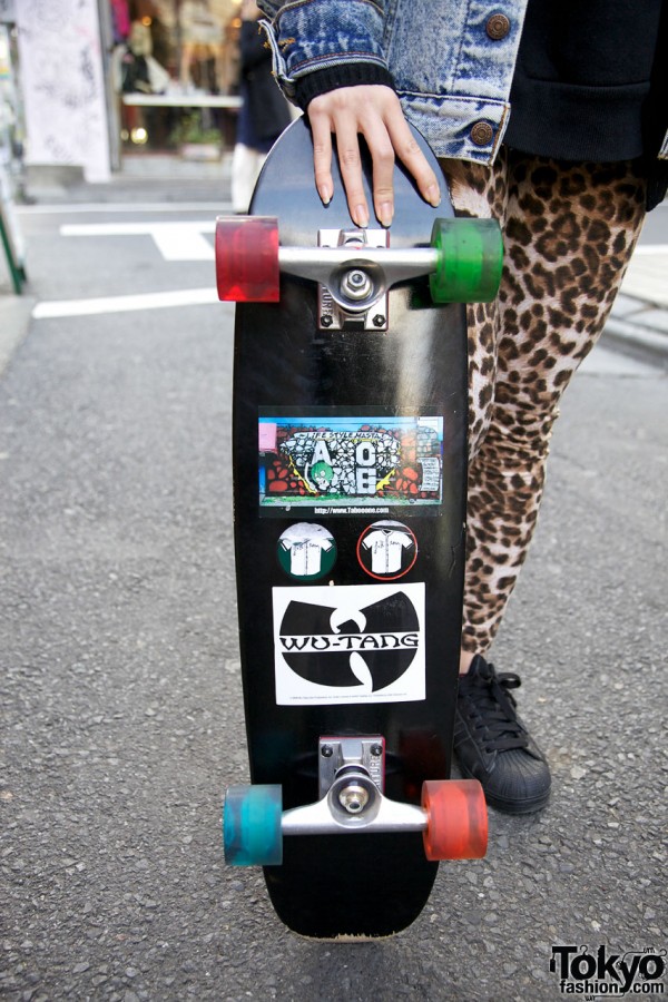 Skateboard with Wu-Tang sticker in Harajuku