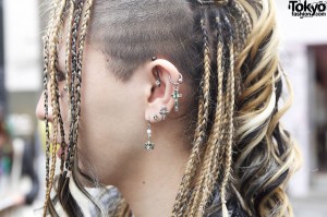 Multiple earrings & long braids in Harajuku