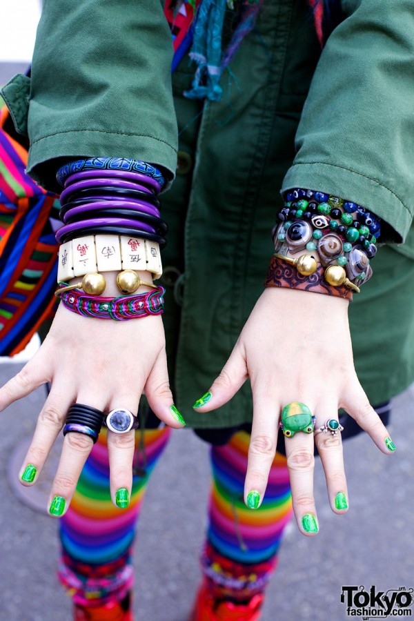Bangles, bracelets & rings w/ green nails