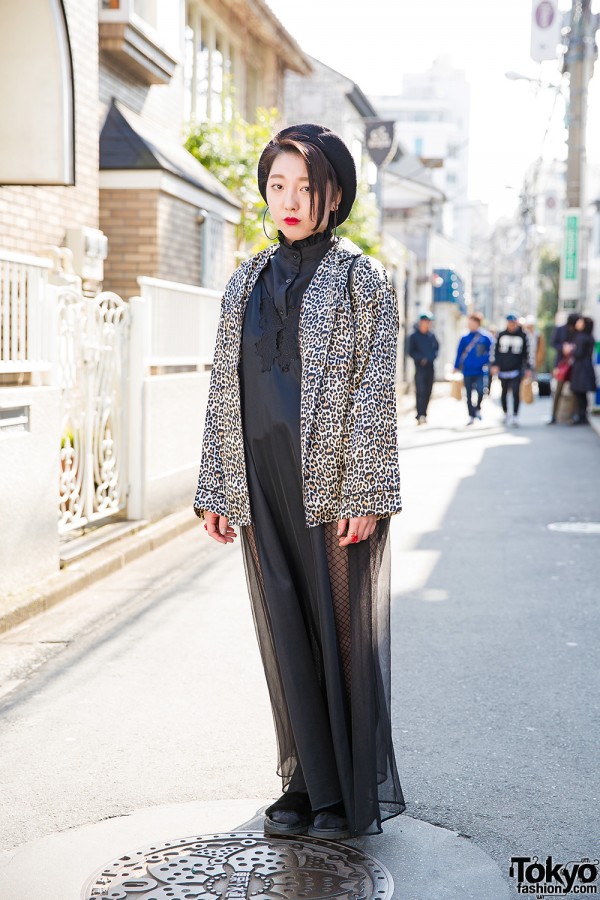 Harajuku Girl in Animal Print Jacket, Faux Fur Slides & Leather Backpack