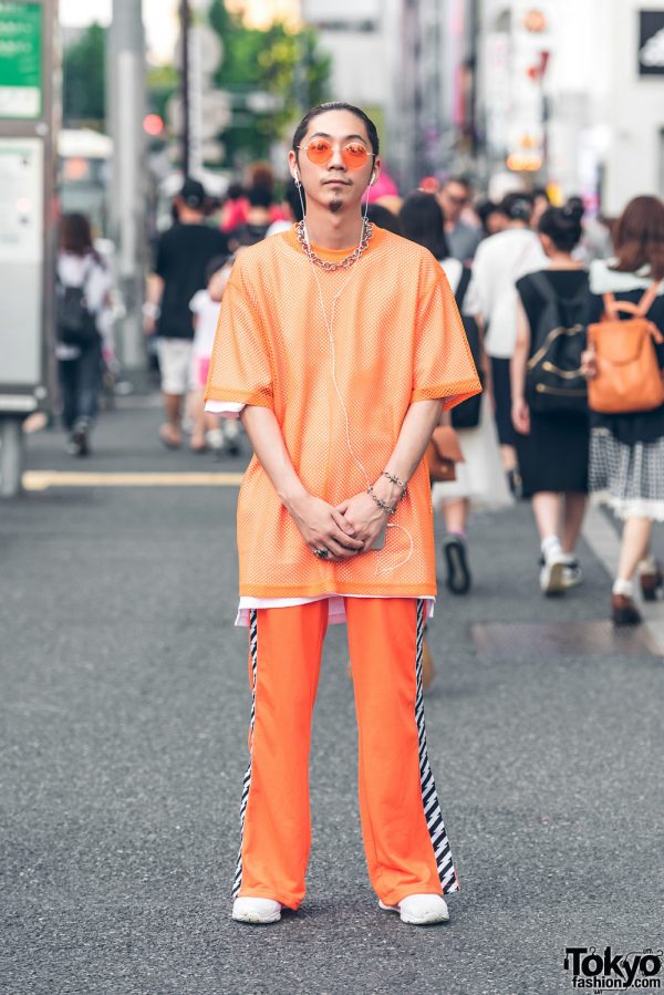 Harajuku Guy in Orange Streetwear Fashion w/ Mesh T-Shirt, Track Pants & Silver Jewelry