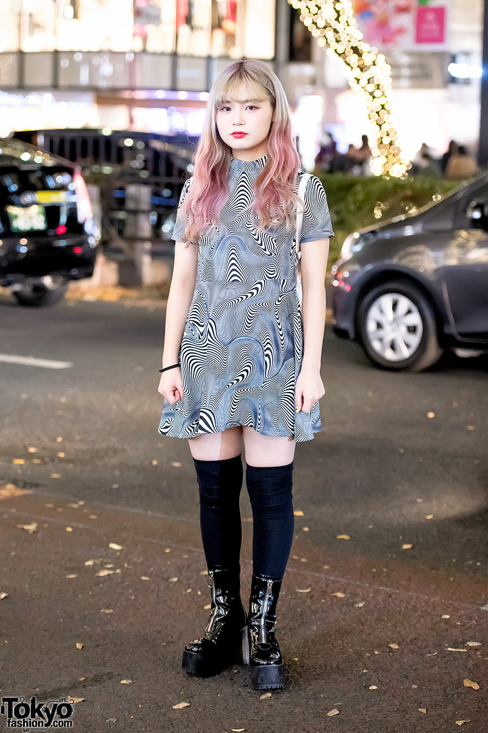 Harajuku Girl in UNIF Optical Illusion Mini Dress, 7% More Pink & UNIF Rainbow Backpack