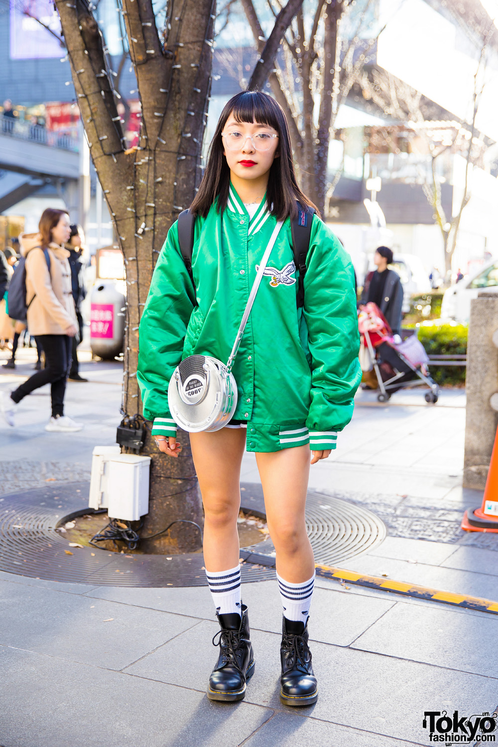 Harajuku Girl Sporty Chic in Green Bomber Jacket, Stussy Top, Moussy Bag & Dr. Martens Boots