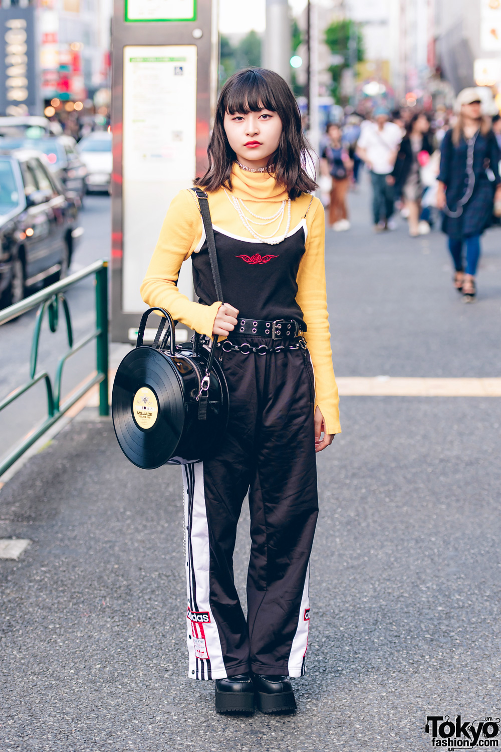 Japanese Student in Faith Tokyo Top, Peco Club Shoes, and G2? Vinyl Record Bag