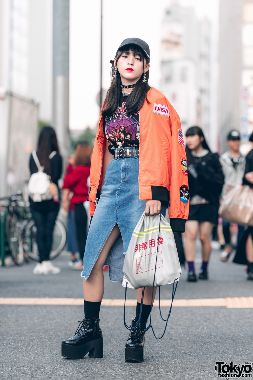 17-year-old Japanese student Daiki on the street in Harajuku wearing a rope  print jacket and rope pr