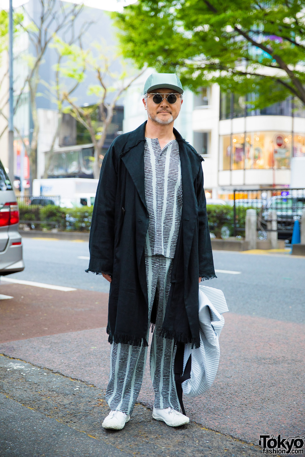 Micro-Pleat Monochrome Street Style w/ Fringed Coat, White Sneakers, Backpack & Pleated Cap