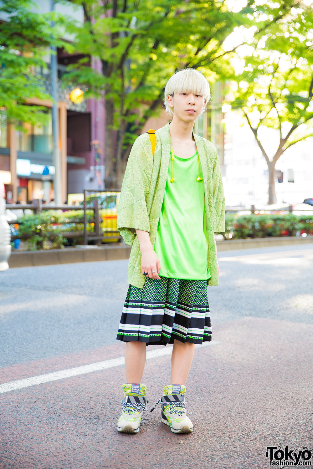 Blonde Japanese Guy in Green Street Style w/ Printed Kimono, New York Joe T-Shirt, Pleated Skirt & Bernhard Willhelm Sneakers