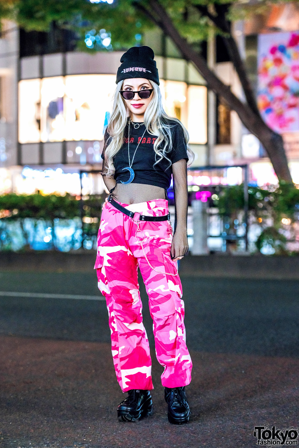 Tokyo Fashion Designer in Pink Camouflage Pants, Fishnet Top, Superradical Beanie & Killstar Necklace