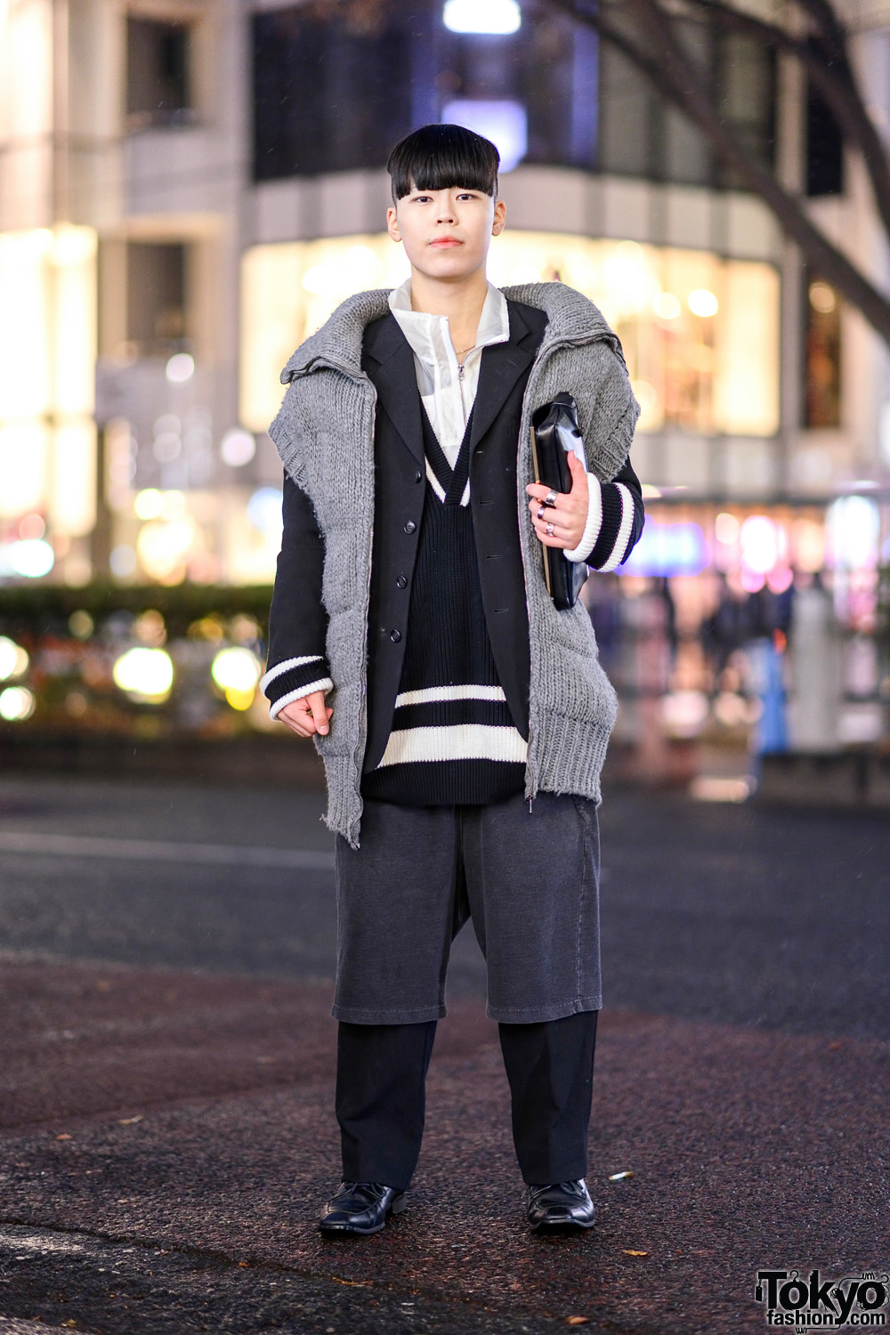 Tokyo Monochrome Layered Street Style w/ Oversized Collar Knit Vest, Blazer, Shorts Over Pants, Leather Lace-Up Loafers & Envelope Clutch
