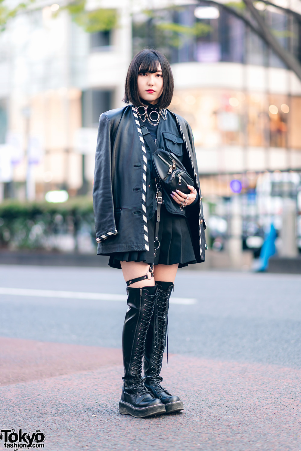 All Black Harajuku Streetwear Style w/ Fringed Bob, O-Ring Choker, Faux Leather Coat, Utility Vest, Pleated Skirt, Waist Bag & Thigh High Boots