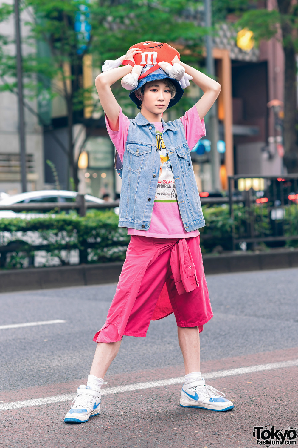 Denim & Pink Streetwear Style in Harajuku w/ Ash Grey Hair, Vintage Print T-Shirt, Dickies Long Shorts, Disney Denim Vest, M&Ms Backpack & Nike Sneakers