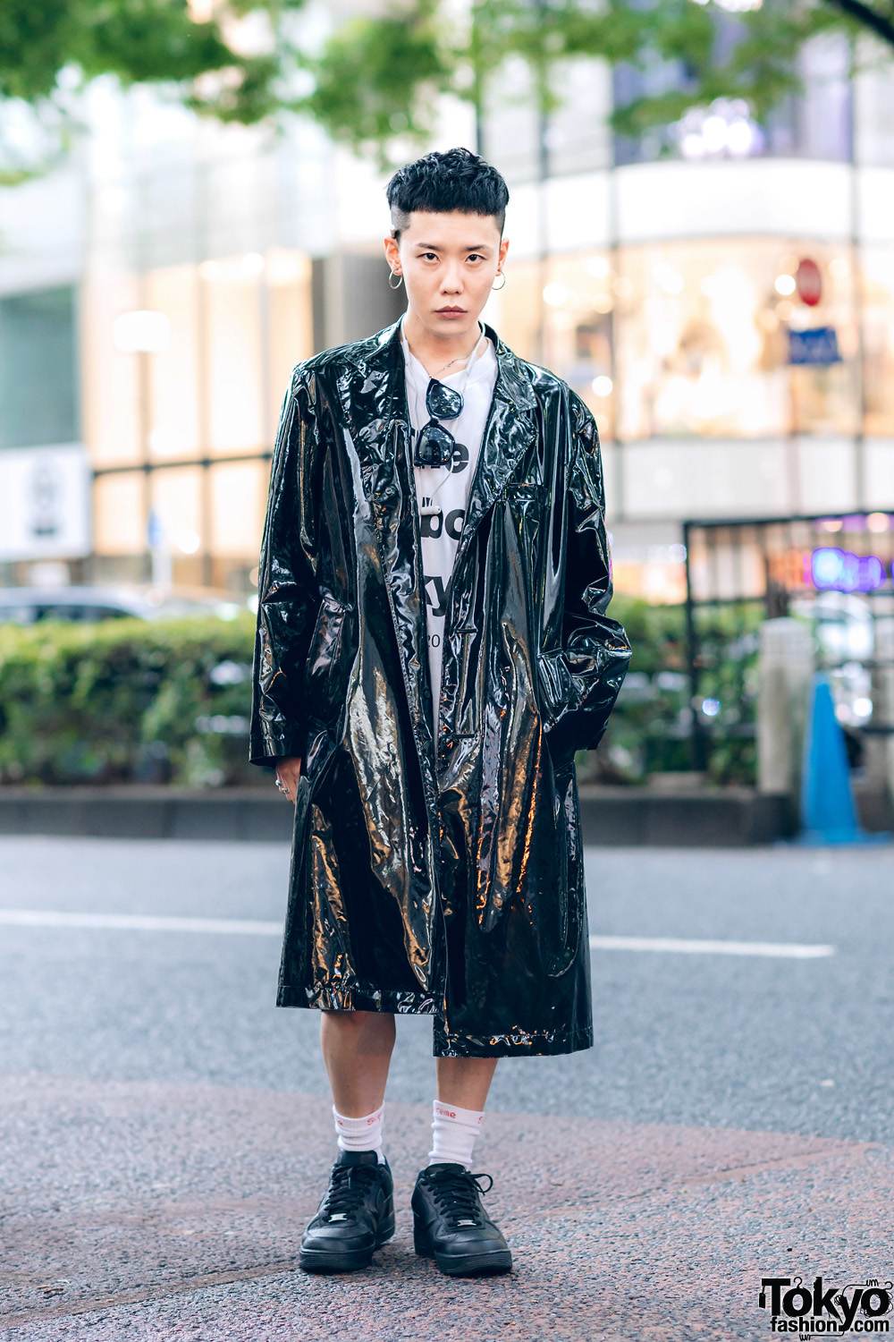 The Symbolic Tokyo Designer in John Lawrence Sullivan Shiny Coat, TST Shirt, Jil Sanders, Supreme & Nike Sneakers