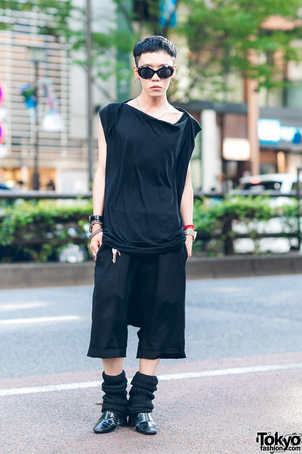 The Symbolic Tokyo Designer in All Black Rick Owens Streetwear Style w/ Asymmetrical Shirt, Cropped Linen Pants, Chrome Hearts Jewelry, Knit Legwarmers & Pointy Boots