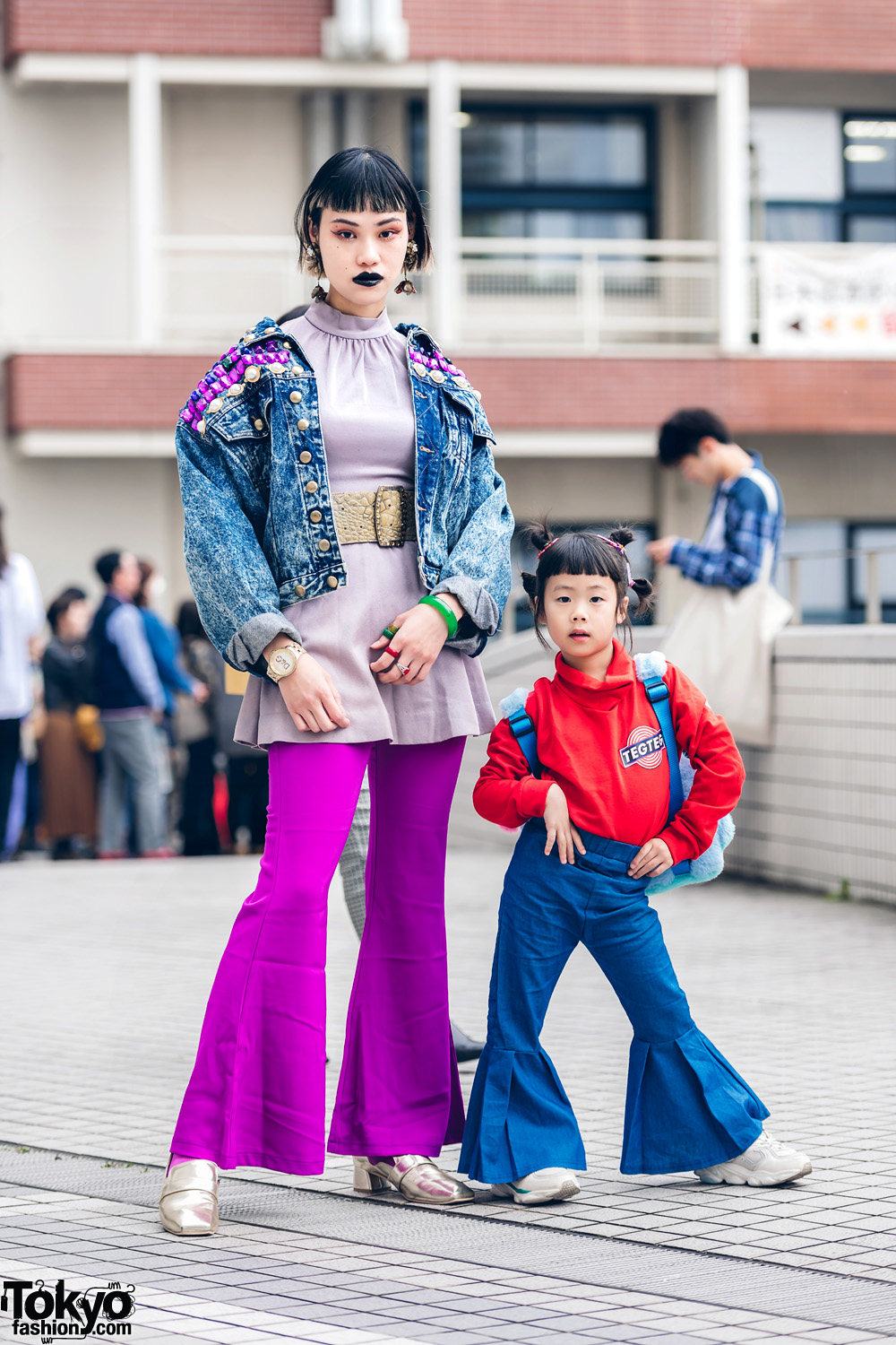 The Ivy Tokyo Mother & Daughter Street Styles w/ Floral Earrings, Vintage Studded Denim Jacket, TEGTEG Sweater, Flared Pants & Verdy x Puchu Monster Backpack