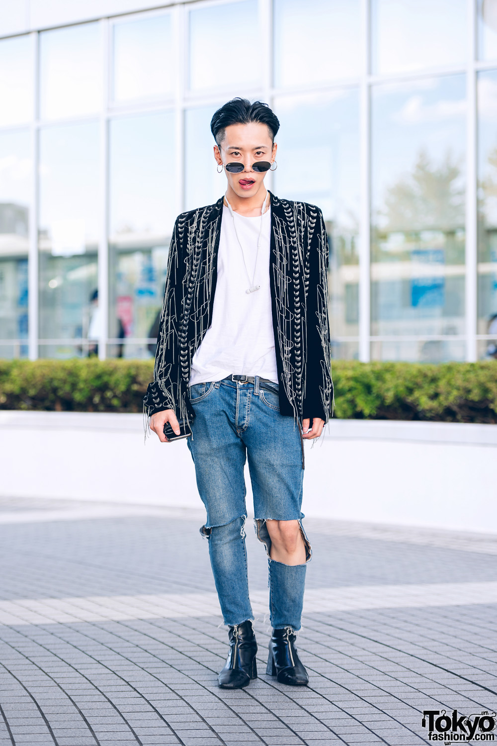 TST Designer in Shinjuku w/ Ray-Ban Sunglasses, Custom Made Fringe Jacket, Saint Laurent Cutout Jeans & Zip-Up Boots