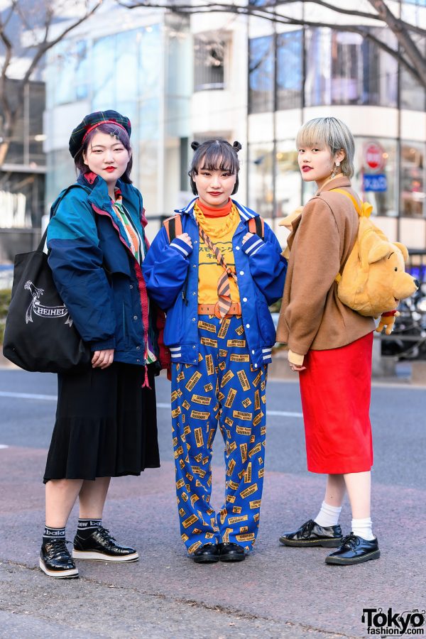 Tokyo Streetwear Styles w/ Purple Hair, HEIHEI Plaid Beret, Shimamura Skirt, Varsity Jacket, Choking Hazard Pants, Winnie The Pooh Backpack, & Dickies