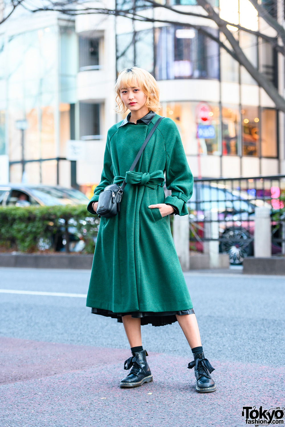 Japanese Model in Minimalist Street Style w/ Murua Belted Coat, Zara Faux Leather Dress, Coach Bag & Dr. Martens Boots