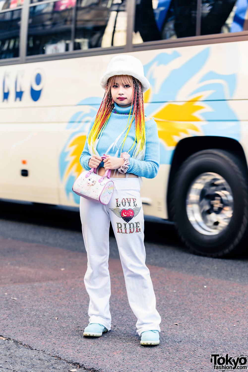 Pinnap Tokyo Streetwear Style w/ Fuzzy Hat, Colorful Braids, Cropped Turtleneck Sweater, Love Ride Sweatpants, H&M Princess Elsa Bag, VidaKush & Blue Boots