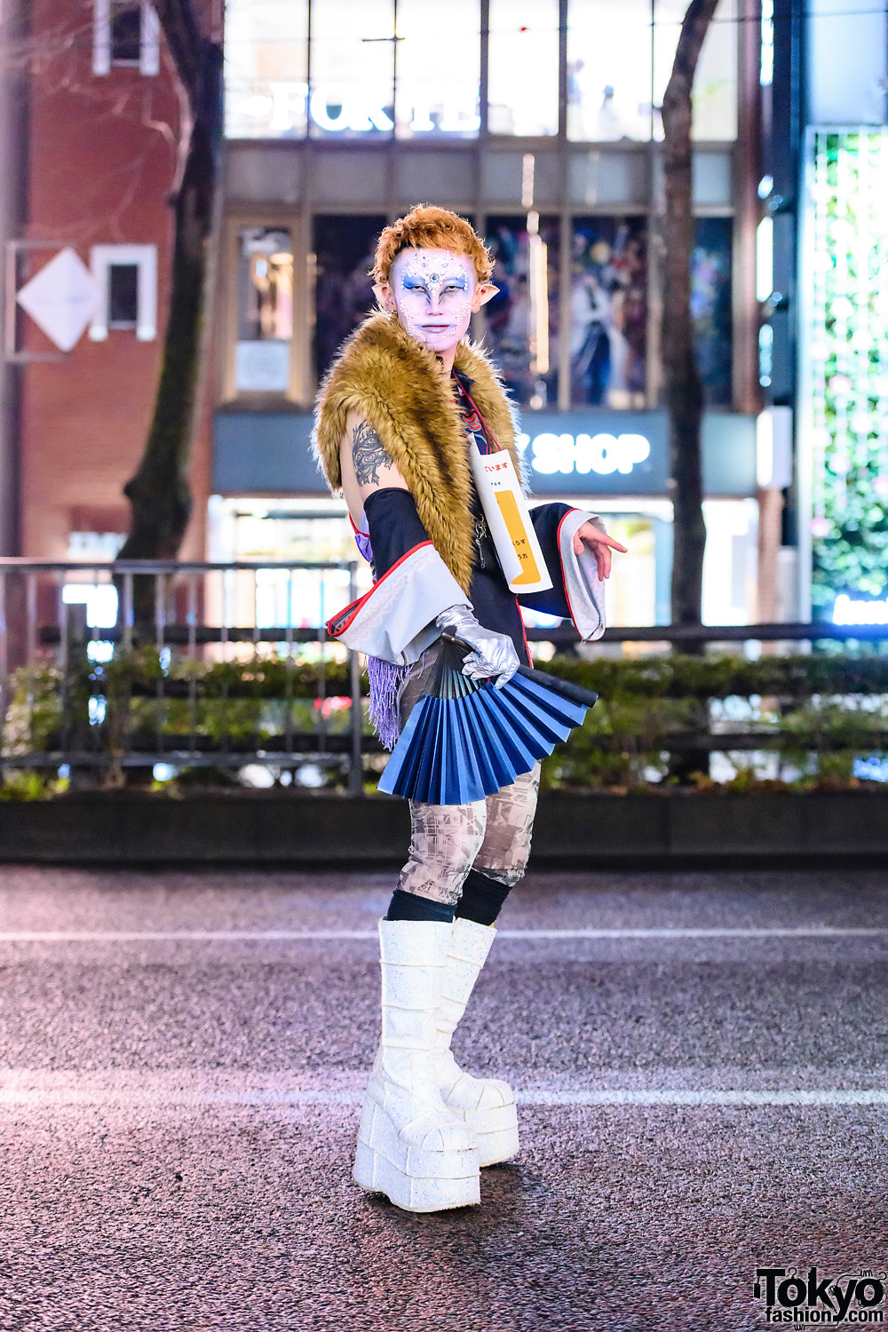 Japanese Graphic Designer's Street Style w/ Elf Ears, Jeweled Face, Faux Fur Vest, Plastic Tokyo Leotards & Demonia Platform Glitter Boots