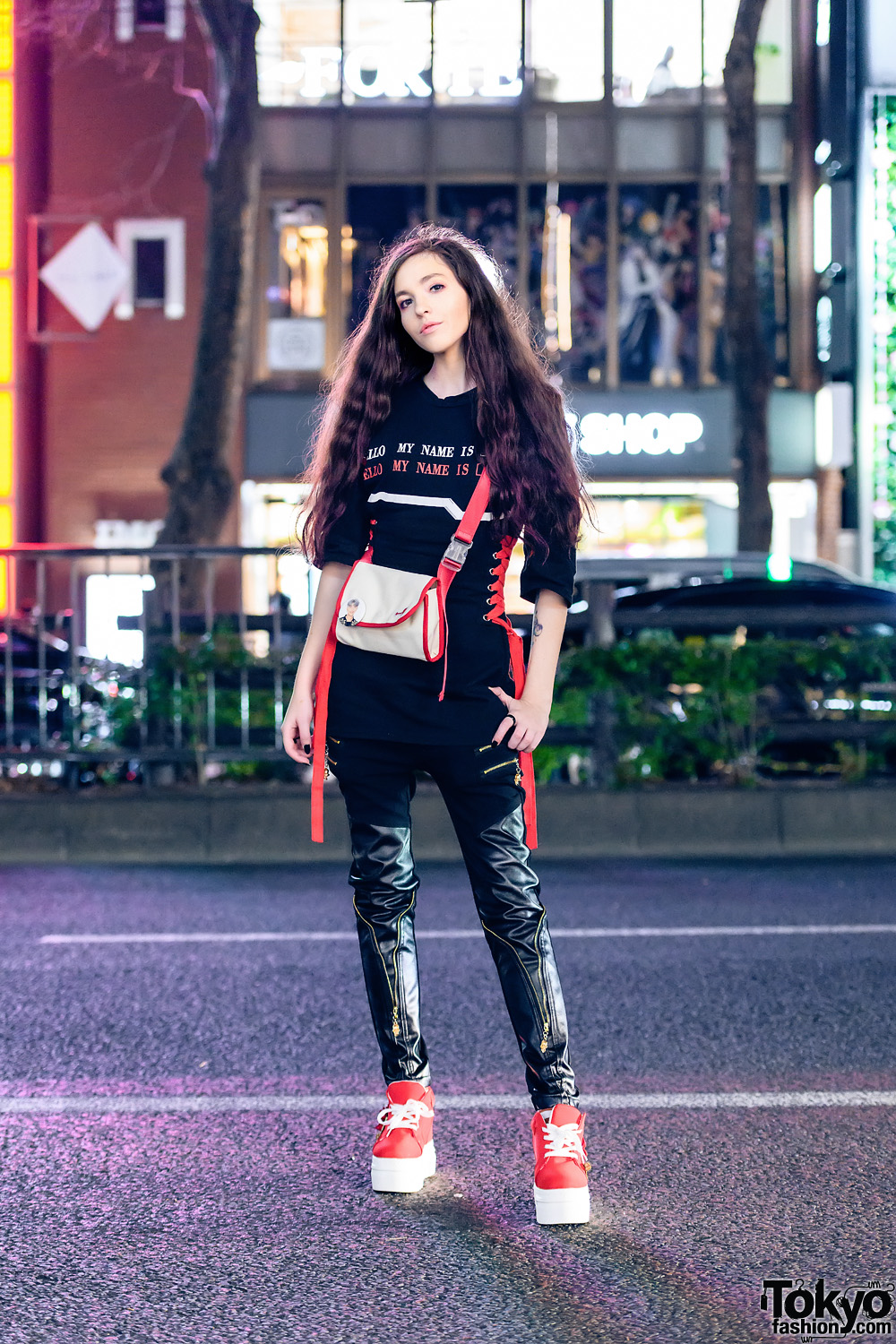 Black & Red Streetwear Look in Harajuku w/ Long Curly Hair, 3/4 Sleeve Corset Top, Skinny Leather Pants, Crossbody Bag & Platform Sneakers