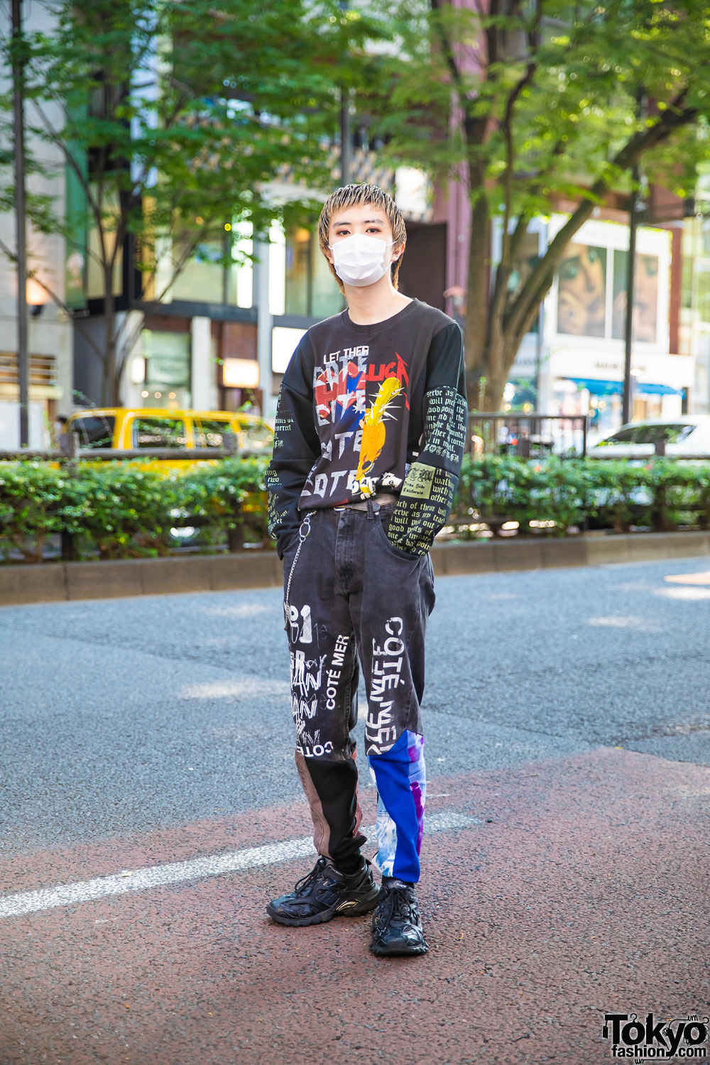 Harajuku Model in Cote Mer Graphic Streetwear Style w/ Face Mask, Half Print Metallica Sweatshirt, Logo Print Pants & Balenciaga Track.2 Sneakers