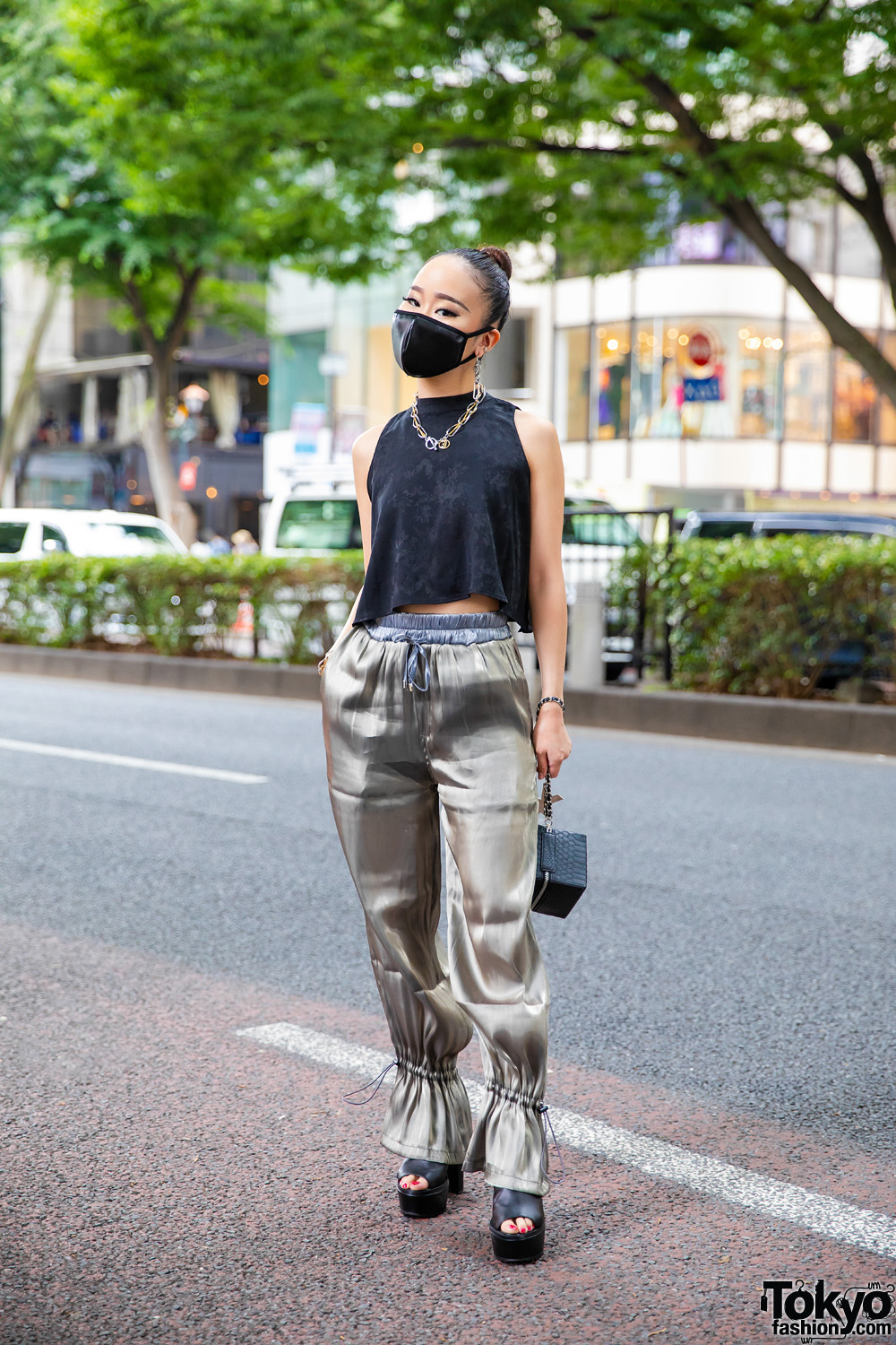 Chic Japanese Streetwear Style w/ Sleek Bun, Two-Tone Jewelry, Satin Mask, Juemi Shininess Code Pants, Yello Snakeskin Box Bag & Envym Peep-Toe Sandals