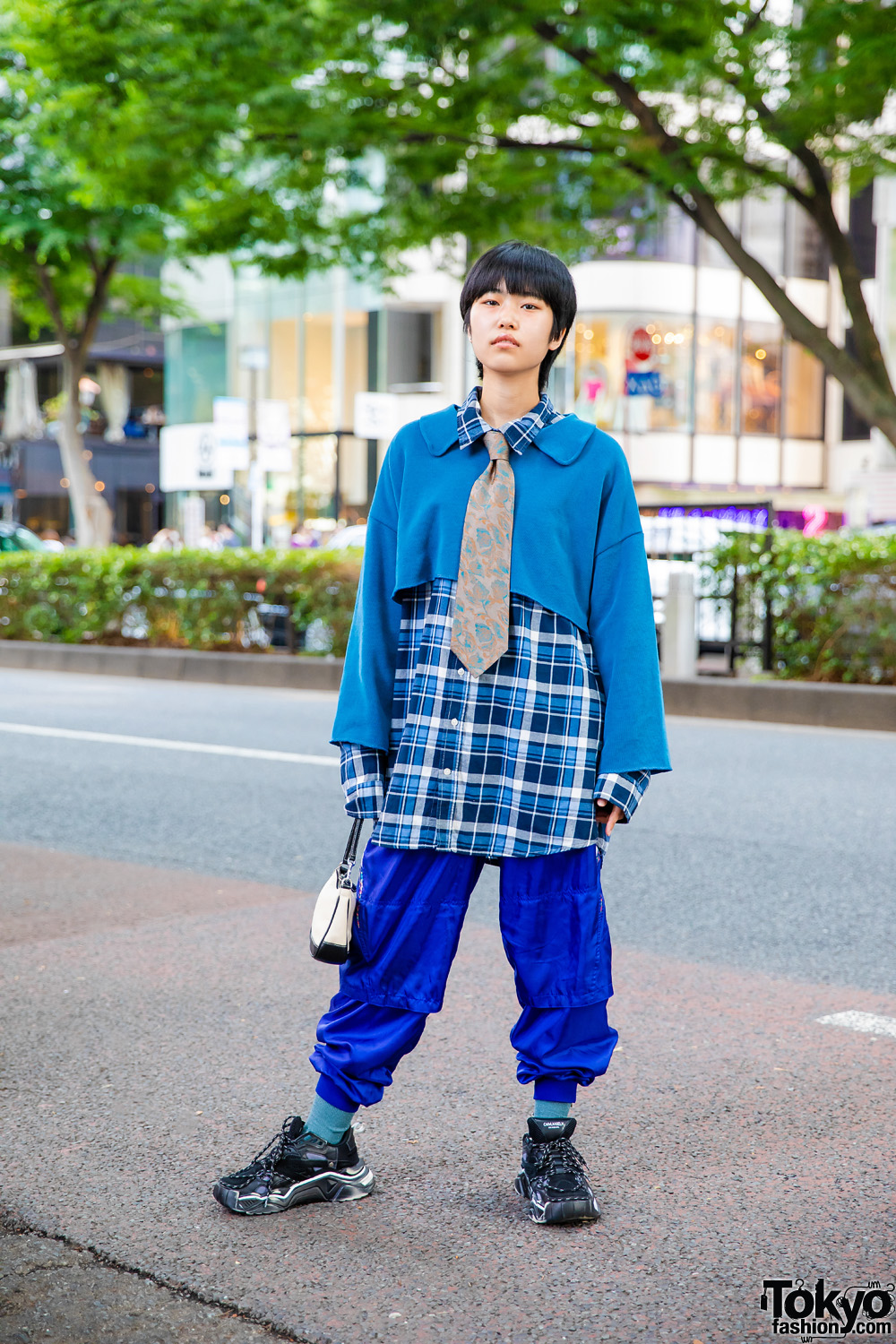 Blue Layered Streetwear Look In Tokyo w/ Pageboy Cut, Floral Print Necktie, Gap Plaid Shirt, Adidas Track Pants, Coach Handbag & Anti Old School Chunky Sneakers