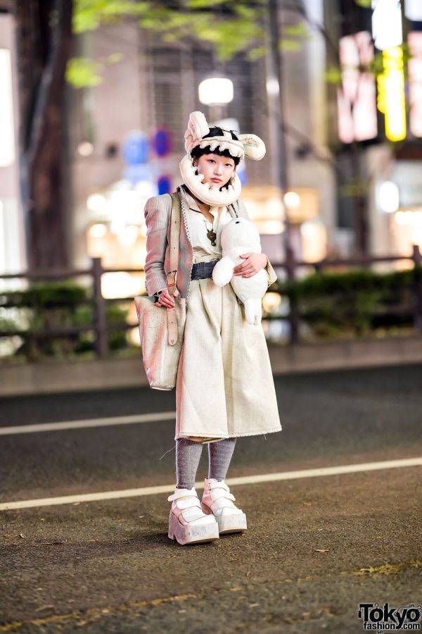 Japanese Designer in Custom Headpiece, Armani Jacket, Wide Short Pants, Kagari Yusuki Bag & Platform Boots